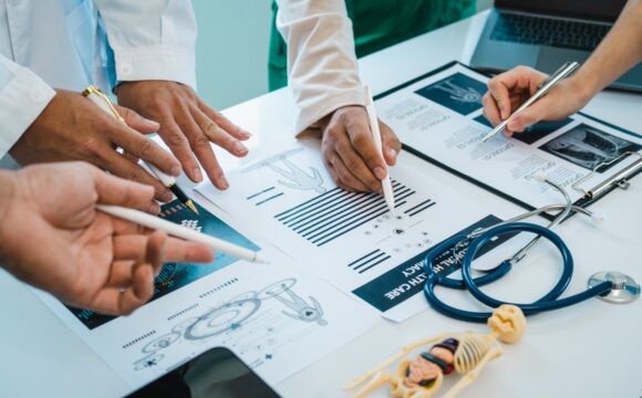 Meeting team of doctor and medical staff at hospital, Consultation about treatment of heart disease Strategic Consultancy for Healthcare Growth & Market Access